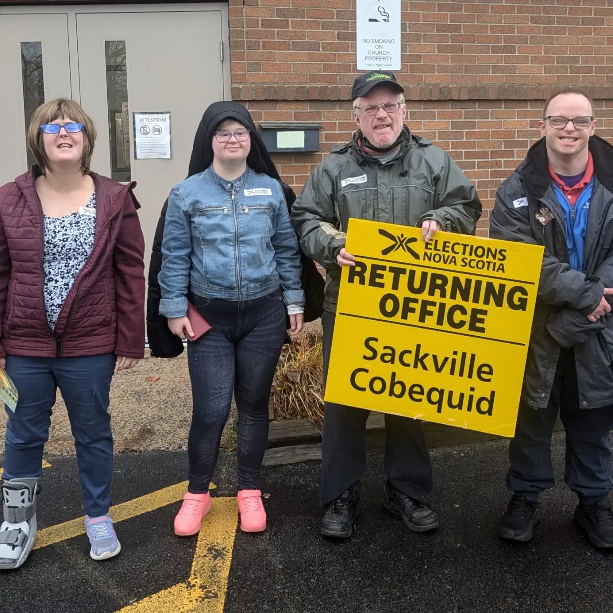 group of people at voting centre