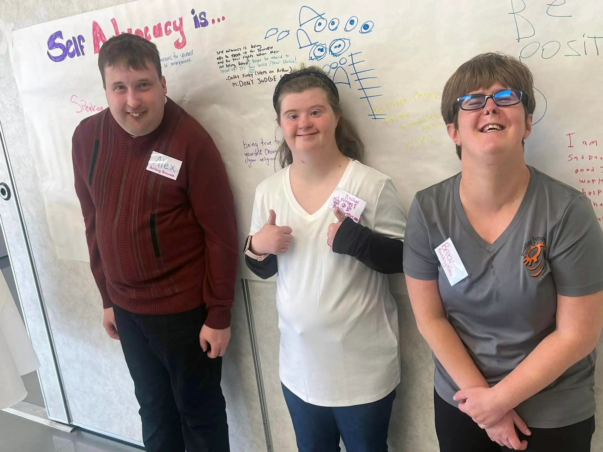 three people at workshop about self advocacy